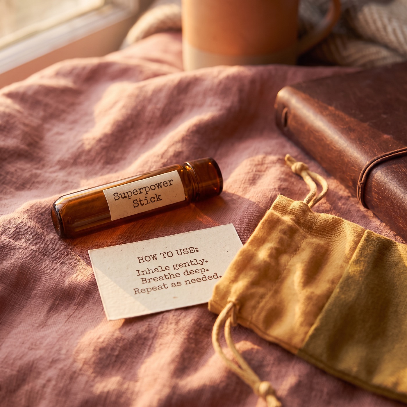 Superpower Stick personal inhaler with a how to use card and pouch